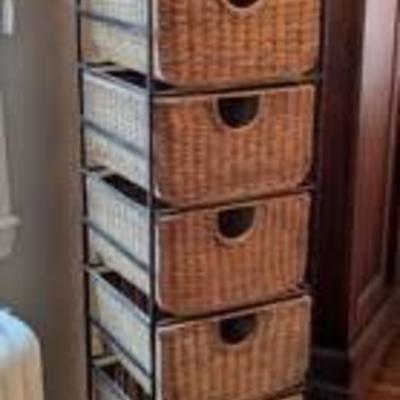 Six Drawer Wicker Storage Unit. A nice piece that appears to be in very good condition.

Measures 16” x 15” and 64” high.