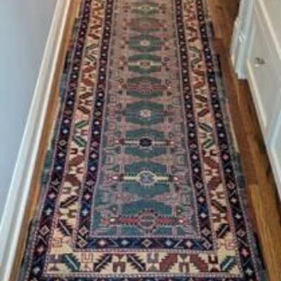 Colorful Turkish Wool Runner.

 There is some wear to the edges and braided fringe. Please see photos for additional details.

Measures...