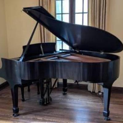 Steinway & Sons Model M Ebony Baby Grand Piano.

A truly beautiful piano! There are some surface scratches on the outer cabinet and...