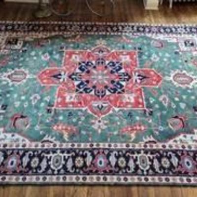Colorful Turkish Wool Area Rug.

 There is some light wear and several braided fringes are coming undone. Please see photos for...
