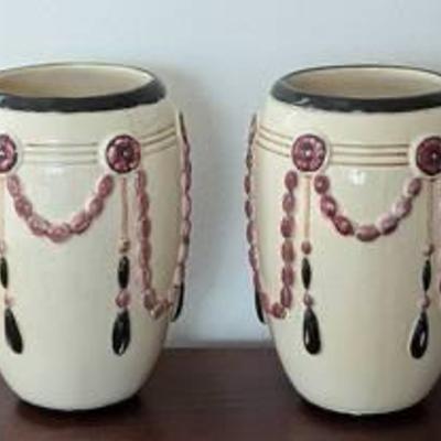 Pair of Antique Weller Pearl Vases.

Both have light crazing and one has a small hairline crack. Please see photos for additional...