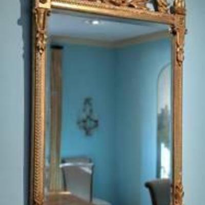 Stunning Gold Vintage Carved Wood Wall Mirror.

A beautiful statement piece for any wall! There is some light wear on the wood but in...