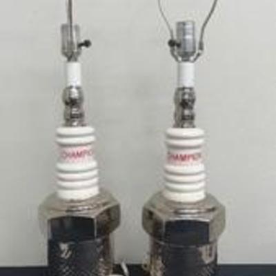 Pair of Vintage Porcelain Champion Spark Plug Lamps

Unique and fun man cave decor~

No lampshades

One lamp has slight wear