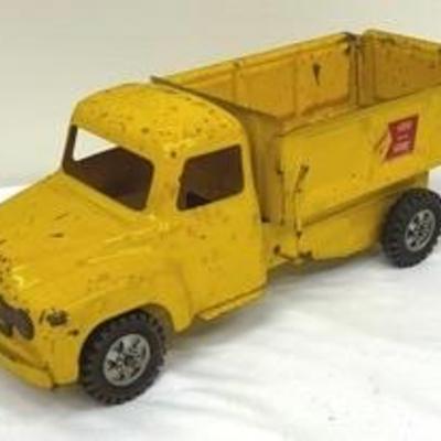 Vintage Buddy L Pressed Steel Sand and Stone Dump Truck 

Item in vintage condition with some wear including paint loss 

Measures about...