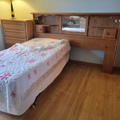 Twin bed and a large headboard
