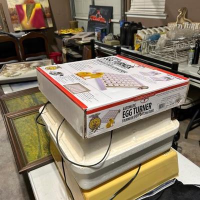 Egg hatching incubators and egg rotator equipment. 