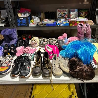 Girl kids shoes and colored wigs.