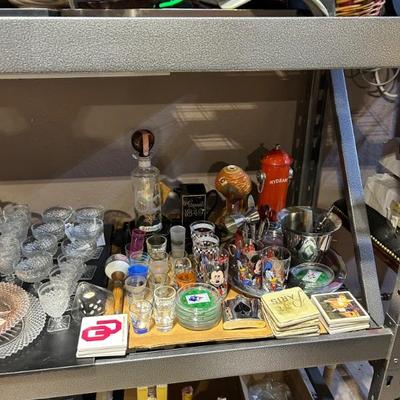 Liquor mixing and various cup holders. 