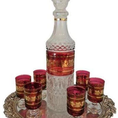 Lot 030  
Ruby Flash Gold Trim Decanter with Stemmed Glasses