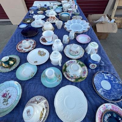 lots of vintage dishes, cups and saucers...
