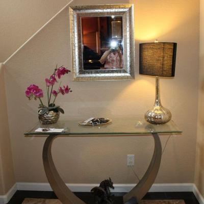 Elephant tusk style design entry table with matching silver hammered bowl and lamp