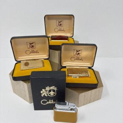 A Spark of Nostalgia: 4 Colibri Lighters & Cases Set 1	