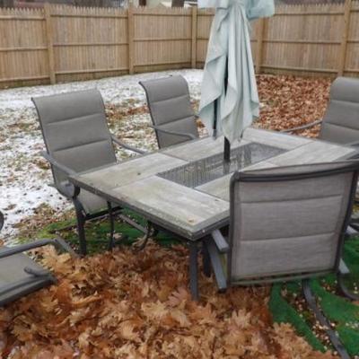 Stone Table With Six Dining Chairs and Umbrell