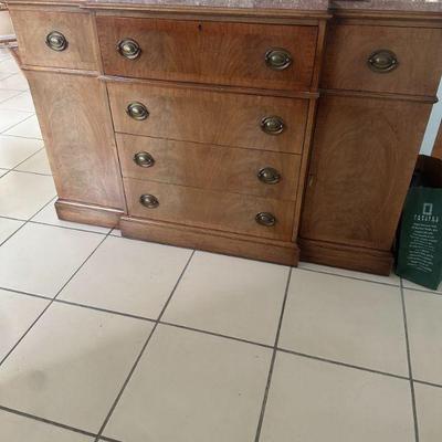 Vintage buffet with marble top and drawer opens to desk