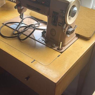 Singer sewing machine with cabinet