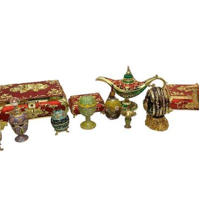 TEWA825 Cloisonné Enamel Trinket Box Collection	Includes a lidded box trio, an enameled jeweled camel figure, and numerous jeweled egg...