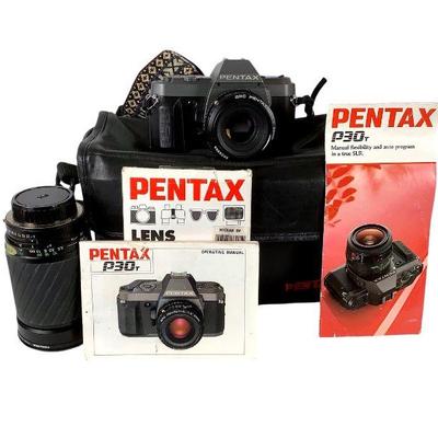 TEWA214 Pentax P30T 35mm Camera With Extra Lens	Comes with a ProMaster Spectrum 7 auto zoom f=28 200mm. Has original manual and camera...