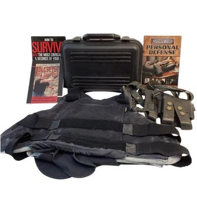 TEWA716 Second Chance Vest, Galco Shoulder Holster, Gun Case And Books	The Second Chance body armor with shield and leather shoulder...
