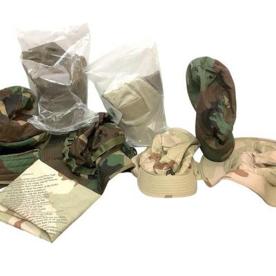 TEWA826 Tactical Attire Hats	Includes camo pattern 11 hats and a bandana. Very clean. Hat size ranges between 7-1/8 and 7-3/8. Head model...
