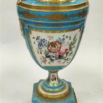 FRENCH PORCELAIN URN. MOUNTED ON WOOD BASE