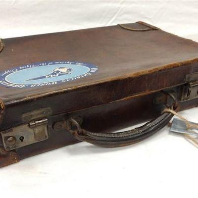 MINIATURE SUITCASE WITH PAN AMERICAN STICKER. DOESN'T CLOSE