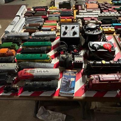 A huge Lionel Train collection that dates back to the 1920's featuring engines, locomotives, boxcars, tracks, power supplies,...