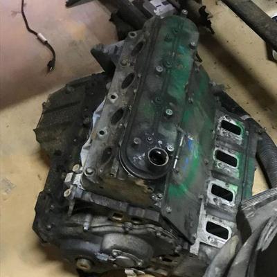 Dozens of Vintage Car Parts - Engines, Body Parts and Electronics