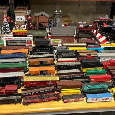 A huge Lionel Train collection that dates back to the 1920's featuring engines, locomotives, boxcars, tracks, power supplies,...