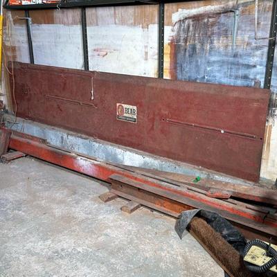 Bear Safety Service Door | Large metal door, with Bear Safety Service decal, hinges on one end, with support. - 28.5" x 10'...