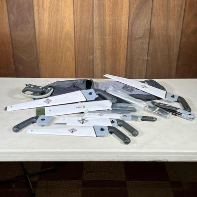 Handyman Club Of America Saws | Including a machete and saws and blades in a carrying case.