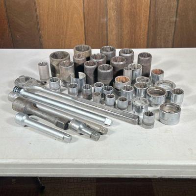 Oversized Sockets | Including a Proto Los Angeles oversized ratchet 3/4 inch drive (l. 20 in.), plus two extenders, and a large group of...