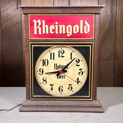 Rheingold Beer Clock | Formed plastic electric wall clock by Rheingold Natural Beer breweries. - h. 18 x w. 14.75 x d. 3.25 in

