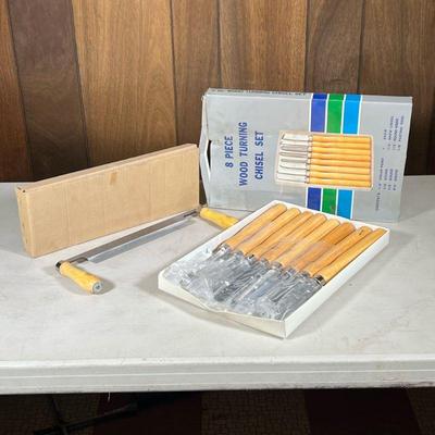 (2pc) Woodworking Tools | Including a hand saw and an 8 piece wood chisel set.