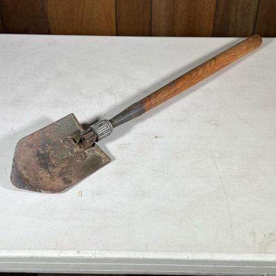Vintage Pack Shovel | Wood handle, the shovel marked “US WOOD”. - w. 6 x l. 32 in