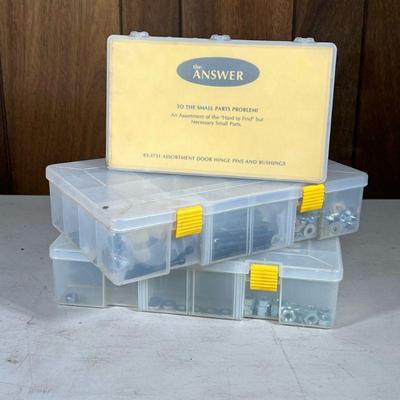 Hex Bolts & Other Hardware | A large box of hex bolts, washers, and other hardware.