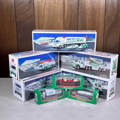 (8pc) Hess Trucks | Including a 2002 Miniature Hess Voyager, and 2004 and 2006 miniature trucks, plus more.

