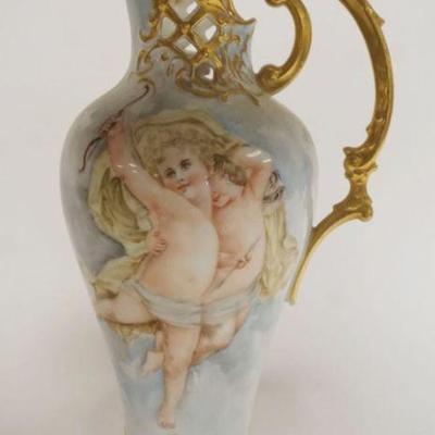 1018	GERMAN PORCELAIN HAND PAINTED EWER W/IMAGES OF CHERUB & ROSES, GILT ACCENTS & TRIM, RETICULATED EDGES ON TOP, APPROXIMATELY...
