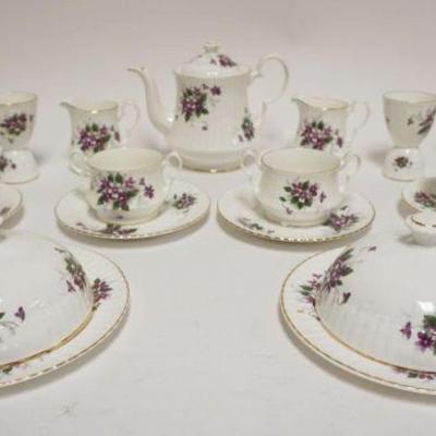 1002	ROYAL WINDSOR FINE BONE CHINA ASSORTMENT INCLUDING 7 IN HIGH TEAPOT, CREAMERS, EGG CUPS, COVERED DISHES
