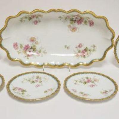1005	LIMOGES OVAL SCALLOPED EDGE SERVING DISH W/FLORAL DECORATIONS & 8-6 1/2 IN SCALLOPED EDGE GILT ACCENTED DISHES, MARKED LS&S
