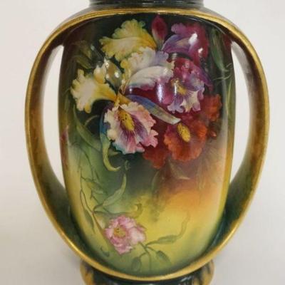 1039	LARGE ROYAL BONN DOUBLE HANDLED VASE W/IMAGES OF FLOWERS ALL AROUND, APPROXIMATELY 14 IN HIGH
