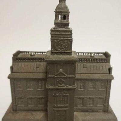 1055	CONTEMPORARY COPY CAST IRON BANK *BIRTH PLACE OF AMERICA INDEPENDENCE*, APPROXIMATELY 10 IN X 8 IN X 11 IN H

