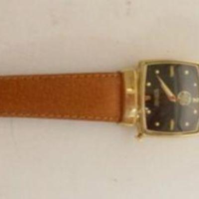 1142	VINTAGE GE HAMILTON ELECTRIC 10K GOLD FILLED WATCH
