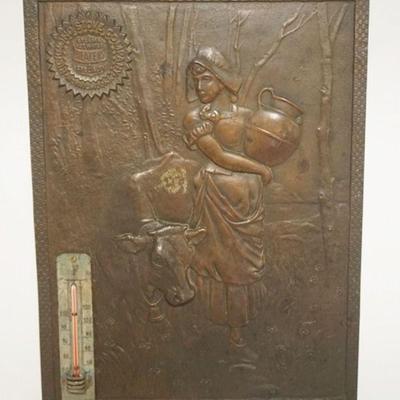 1052	EMBOSSED METAL ADVERTISING PLAQUE FOR RICHMOND STOVE CO., IMAGE OF COW AND WOMAN WITH MILK PAIL THERMOMETER MOUNTED ON LEFT,...