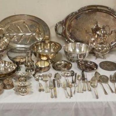 1191	GROUP OF ASSORTED SILVER PLATE ITEMS INCLUDING TEA POTS, SERVING TRAYS, BOWLS, TRIVETS, NAPKIN RINGS, ETC.
