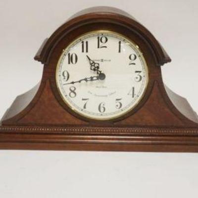 1068	MANTLE CLOCK ASSORTMENT INCLUDING SETH THOMAS, HOWARD MILLER 71TH ANIV. AND BRECKLAN QUARTZ CLOCKS, TALLEST APPROXIMATELY 11 IN H
