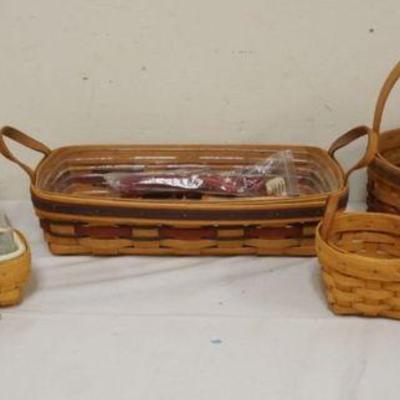 1219	ASSORTED LONGABERGER BASKETS WITH 1992 & 1993 CRISCO BASKETS AND 5 MISC BOOKING BASKETS

