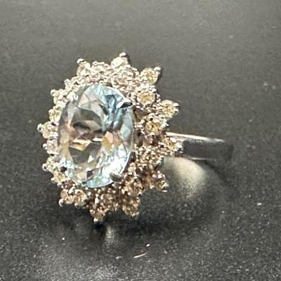 Aquamarine and diamond ring on 14k gold setting, included appraisal certificate