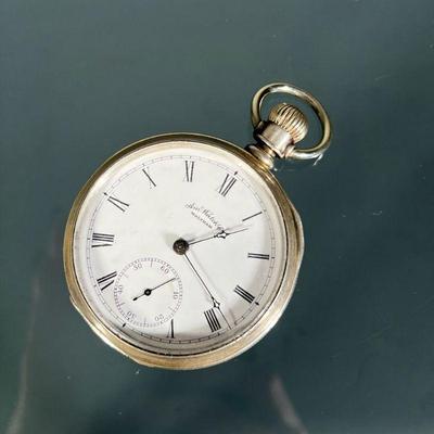 WALTHAM COIN SILVER POCKET WATCH | Am. Watch Co. Waltham coin silver pocket watch Serial No. 79303, Dia. 2 in. with plastic mounted dome....