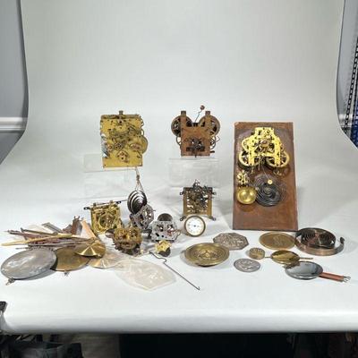 MIXED CLOCK PIECES & PARTS | 4 Boxes of mixed clock pieces in various working order including: Boxes labeled "Spare Mvgts / 2...