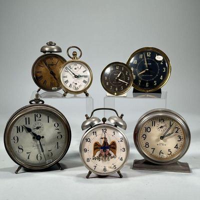 (7pc) MIXED ALARM CLOCKS | Including: Premier 8-day intermittent clock, 2 Westclox Big Ben clocks, Westclox Baby Ben, Robert Shaw Lux...